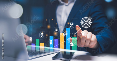Foto Investing for financial growth: businessman using laptop with virtual chart to analyze income and wages increase, economic improvement, and investment portfolio profitability