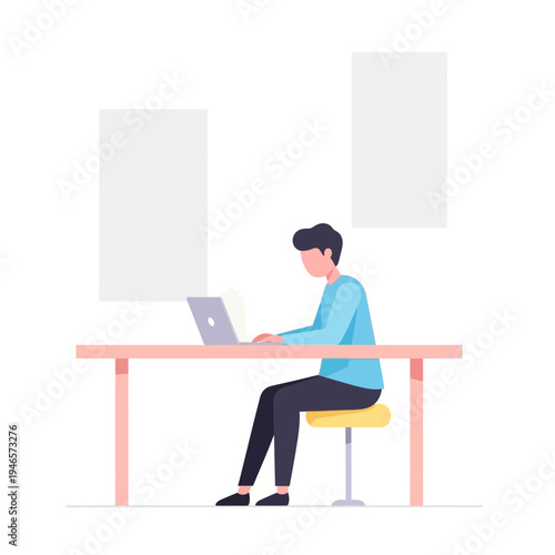 Man working on laptop at desk in office.