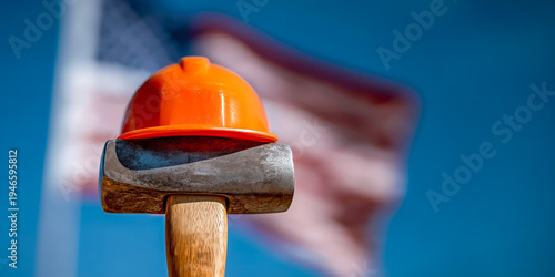Wallpaper Mural American Labor Day poster creates a monumental feel, a heavy steel hammer supports a bright orange construction hardhat, a blue sky, and a huge United States flag fluttering in the wind Torontodigital.ca