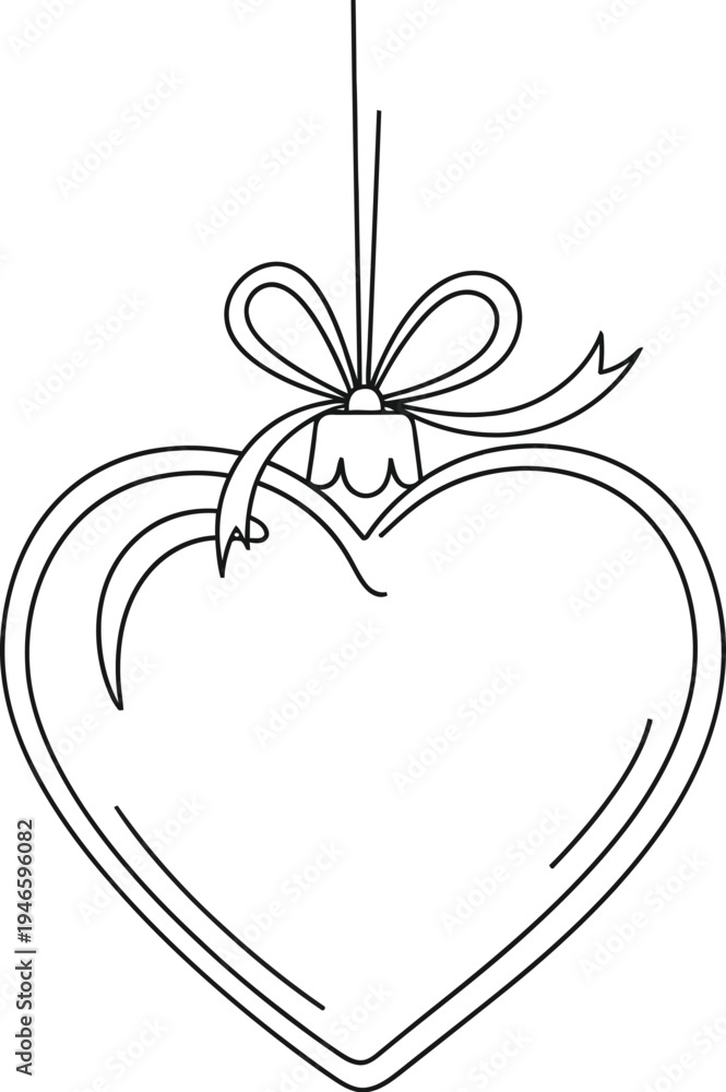 Fototapeta premium Heart shaped ornament with a bow hanging on a string