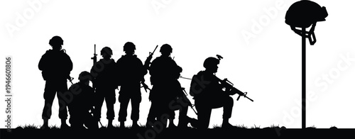 Silhouette of military soldiers standing in field with fallen soldier helmet memorial on pole during sunset for army remembrance day