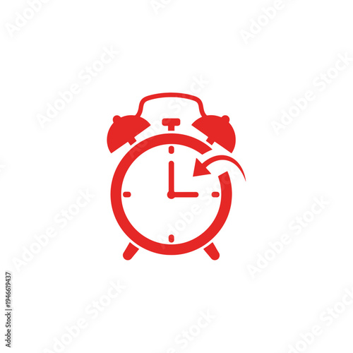 Red alarm clock icon with arrow pointing back for daylight saving time change concept