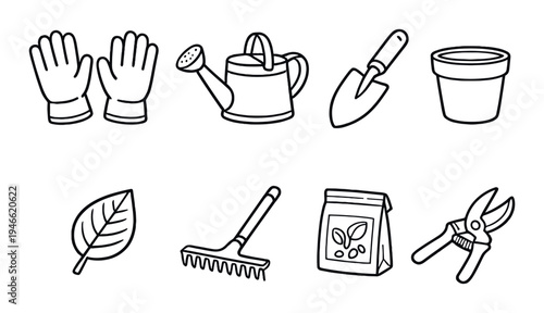Gardening tools and supplies arranged on dark studio background