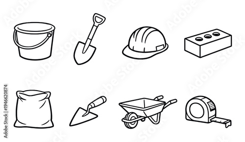 Construction tools and materials arranged on dark background