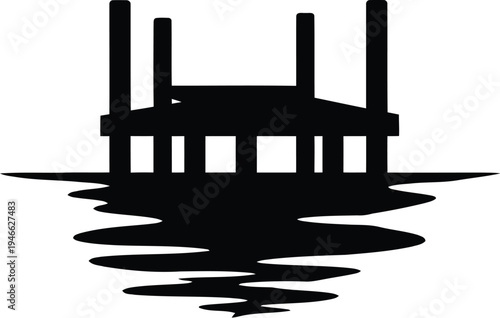 A black silhouette of a pier on water