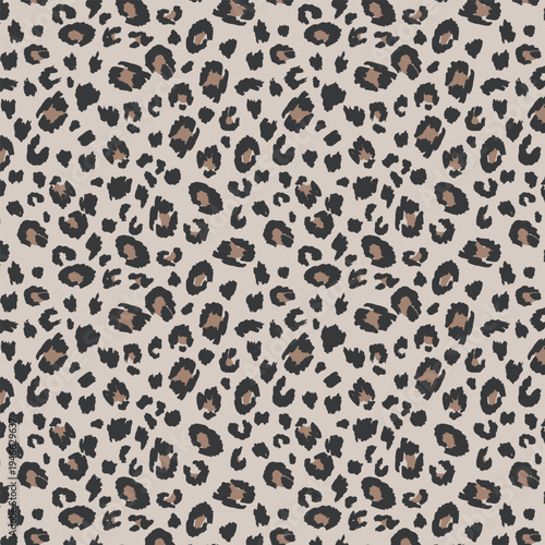 Seamless Chic Leopard Print Pattern with Black and Brown Spots on Nude Background