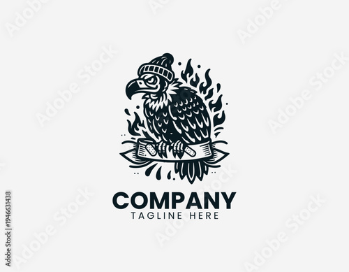 The urban vulture wearing a beanie sits on a burning banner for gritty streetwear branding