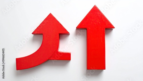 Two red arrows pointing upwards, one curving, on a white surface