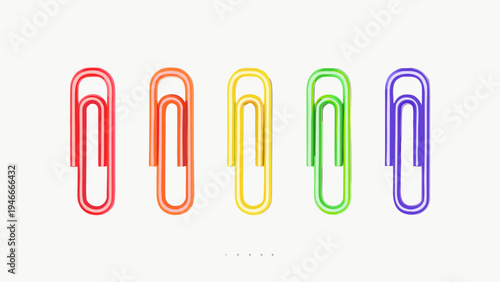 A colorful arrangement of paper clips against a neutral background