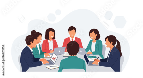 Diverse business team meeting around a table, discussing strategy with laptops and charts.