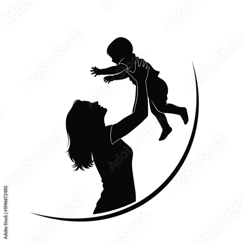 Silhouette of woman holding baby in air  happy family moment