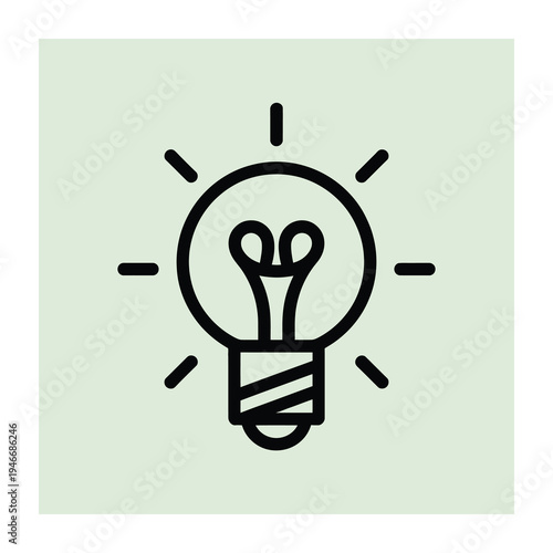 Glowing vector light bulb on a green background