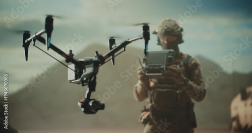 Special Forces Drone Operator Hovers a Tactical Quadcopter Drone at a Desert Base, Battlefield Mapping, Precision Strike, Target Tracking,Reconnaissance With a Control Station Modern Warfare War