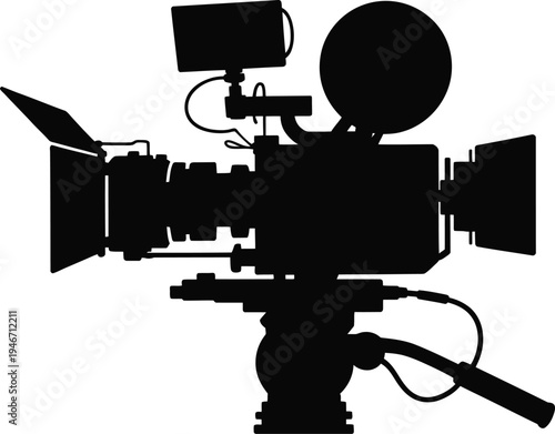 Black silhouette of a professional video camera on a tripod with monitor and microphone