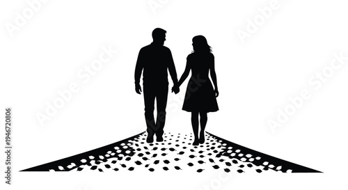 Couple walking hand in hand amongst petals a romantic black silhouette