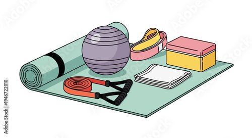 Yoga equipment on a green mat.