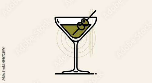 A martini glass with green cocktail and olives.