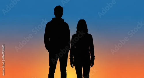Silhouette of a couple standing together against a colorful sunset sky.