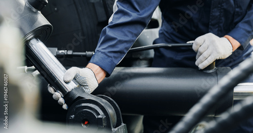 Tableau sur toile Mechanic diagnostics pipe system of hydraulic hose valves in industry machinery