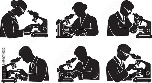Scientists Adjusting Microscope Stage Clips