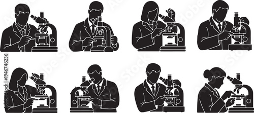 Scientists Adjusting Microscope Stage Clips