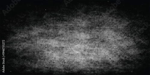 A dark aged abstract grunge background features a rough grey stone texture with a dirty weathered concrete surface design for a vintage black and white backdrop pattern