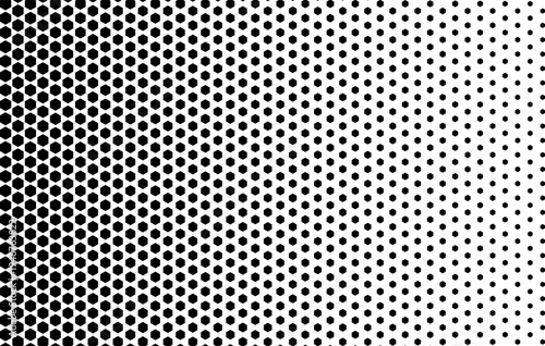 Repeated decreasing hexagons with halftone fading effect. Pattern with vanishing black honeycomb shapes on white background. Simple geometric print. Perforated structure. Vector graphic illustration.