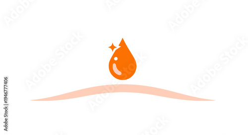 An orange water droplet on a hill.