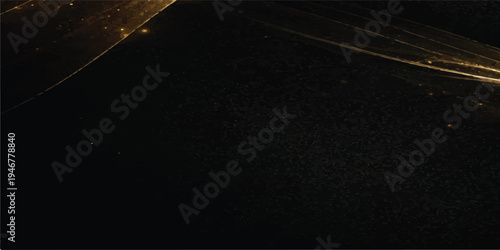 Dark textured background with subtle golden luminous swirls and glitter, abstract luxury design concept, gold background, elegant background, premium background