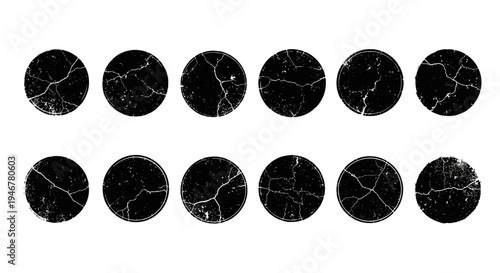 Black marble circles with cracks.