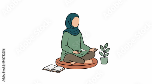 Woman in green hijab and tunic meditating cross legged on cushion beside potted plant and open book