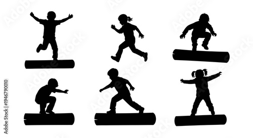 Children Silhouettes Jumping and Balancing on Logs in Outdoor Play