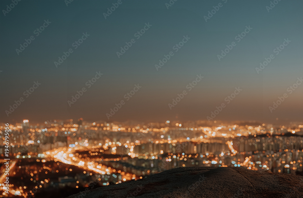 Naklejka premium City night lights, Seoul skyline. High-angle view of the urban city landscape at night with glowing street lights, urban development