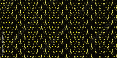 Golden teardrop shapes densely arranged against a dark background