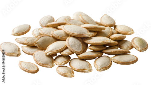 Isolated raw pumpkin seeds arranged in a pile, natural and healthy snack food ingredient