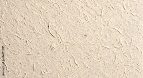 Handmade cotton paper texture with visible natural fibers