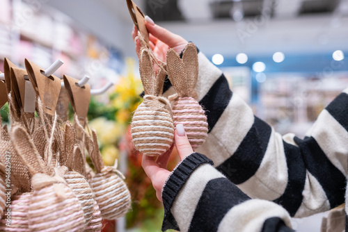 Wallpaper Mural Woman Looking At Decorative Eggs For Easter Torontodigital.ca