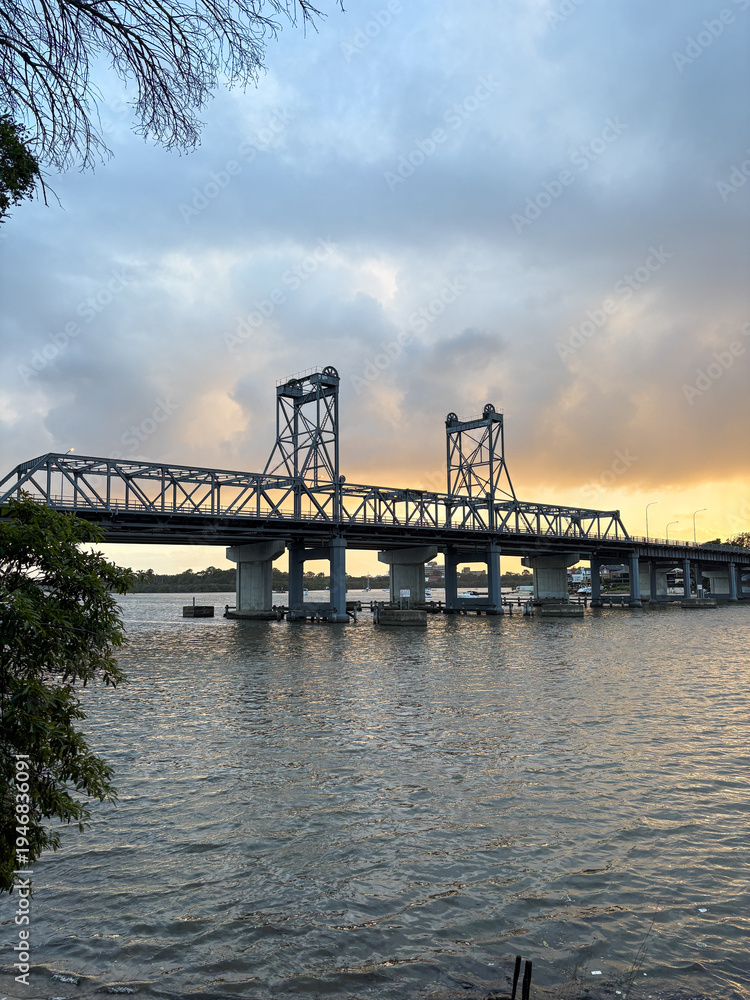 Fototapeta premium View of Ryde Bridge at sunset time, Sydney, Australia.