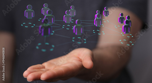 Hand holding digital people...