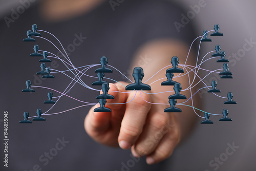 Hand pointing at a digital ...