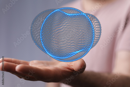 Person holding a 3D digital...