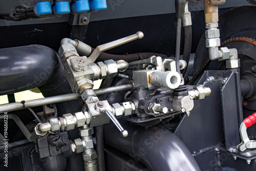 Hydraulic machinery manifold with pipes and valves