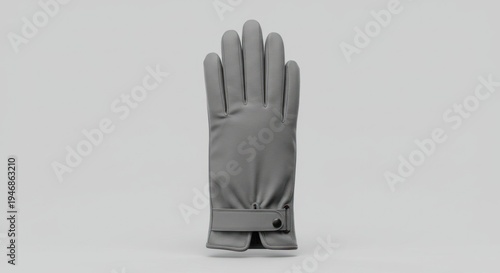 Elegant gray leather glove isolated on white backdrop, providing protection with style for winter