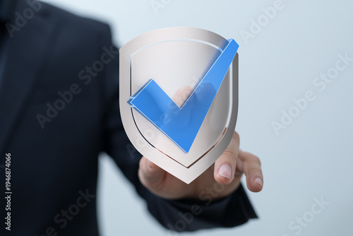 Hand reaching for a shield ...