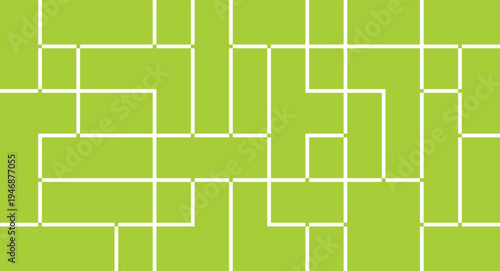 A vibrant green maze with white lines