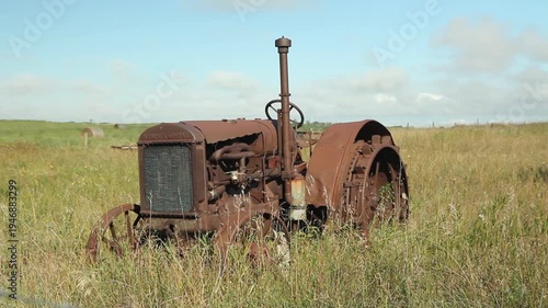 Old, rusty tractor in Saskatchewan, Canada. HD.