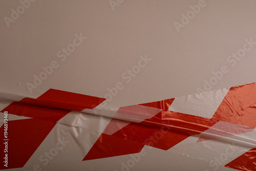 Close-up of hazard tape. Re...