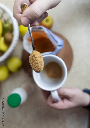 Wallpaper Mural Person adding apple fiber powder to a glass of yogurt, surrounded by fresh apples and walnuts. Healthy prebiotic supplement for gut health, digestion and weight management. Torontodigital.ca