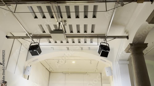 venue ceiling with acoustic installations and projector