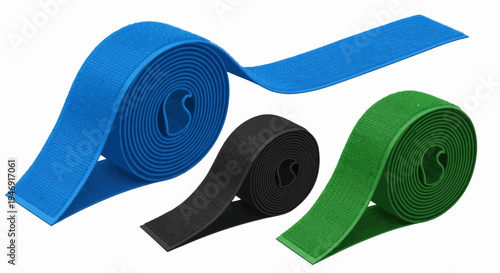 Three colorful rolled and unrolled fabric strips in blue, black, and green